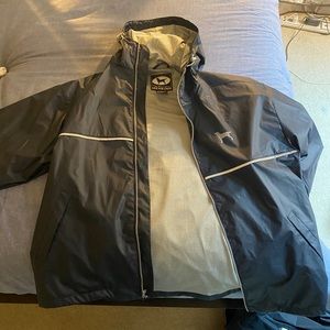 Black dog brand rain jacket. Worn once!